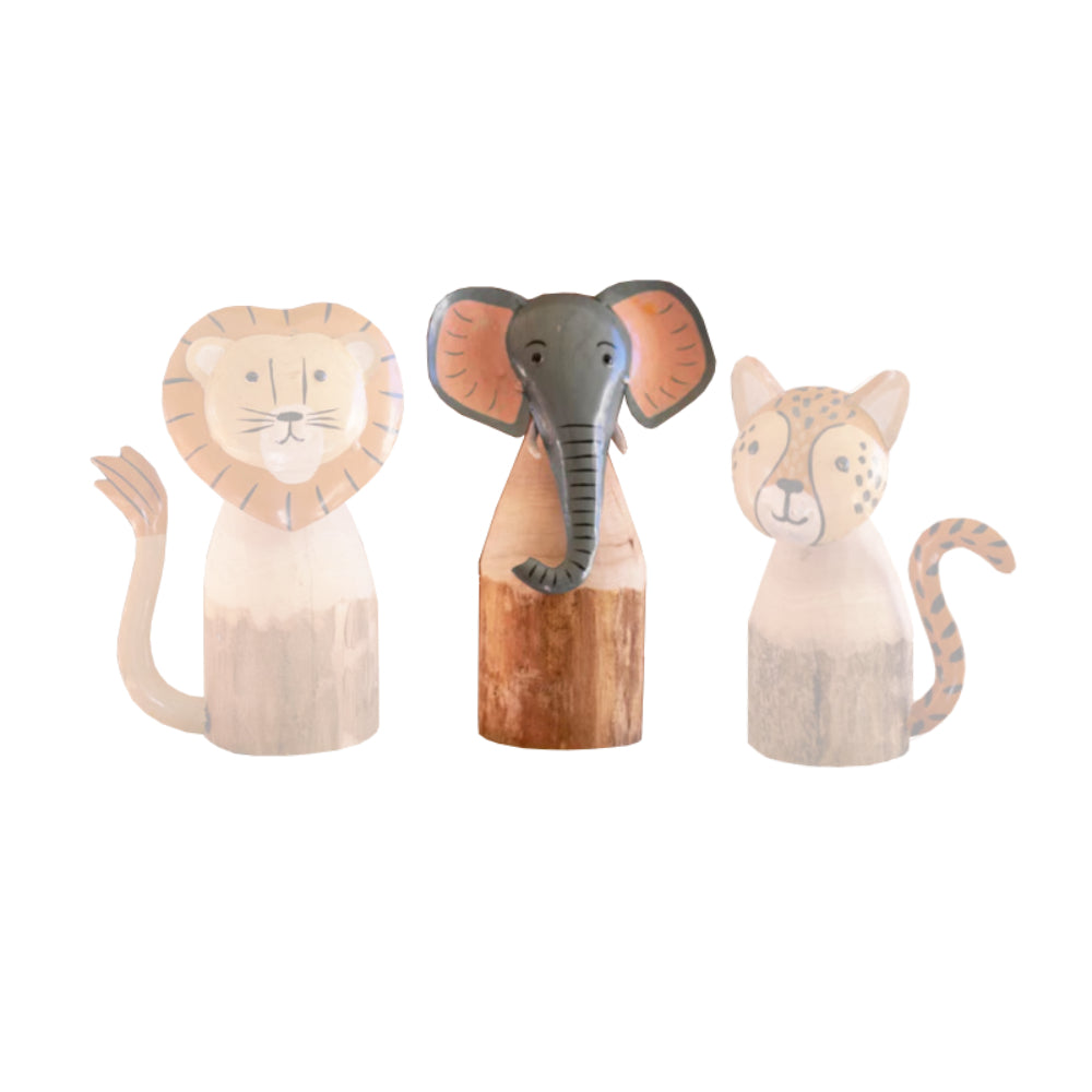 A wooden elephant figurine on a white background