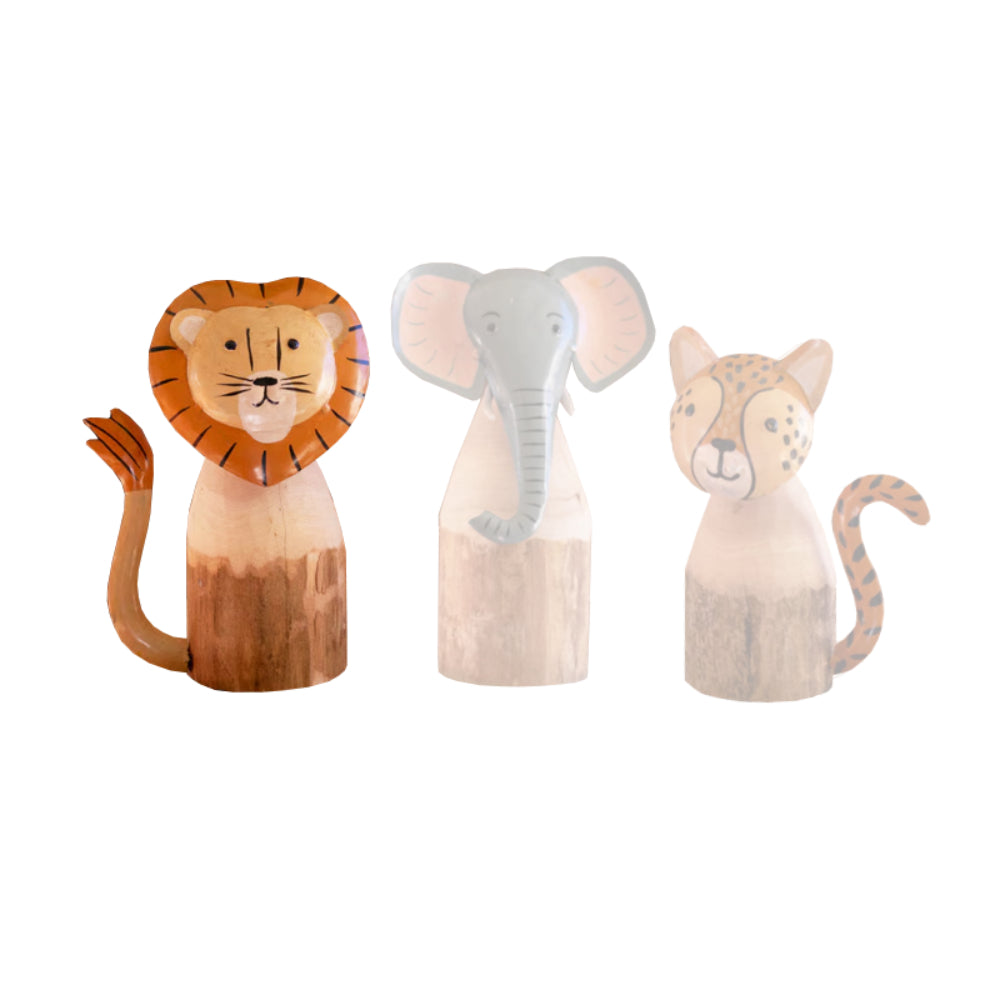 A wooden lion figurine on a white background