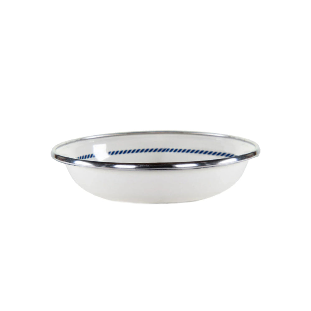 White bowl with blue rim on a white background