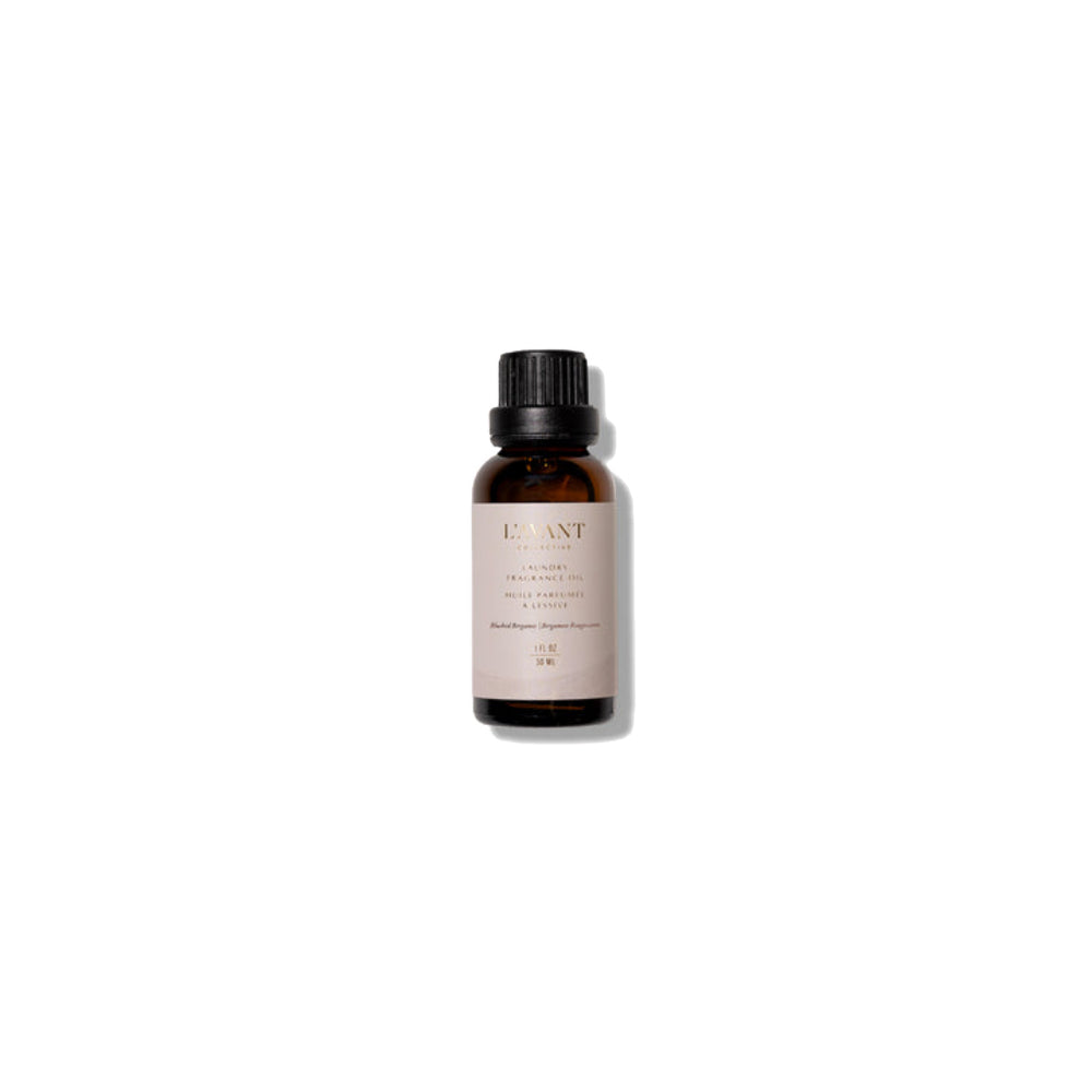A bottle of laundry oil on a white backround. 