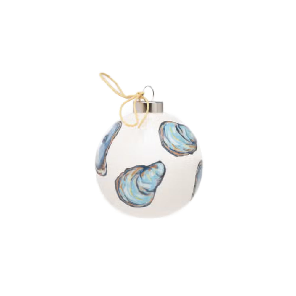 Decorative Christmas ball ornament with shell designs on a white background