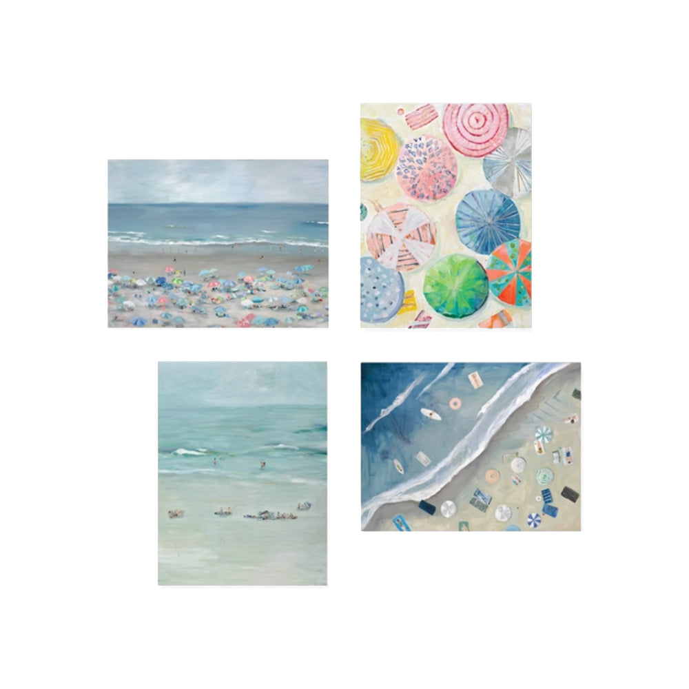 Set of four beach-themed cards with umbrellas, ocean, and sand.