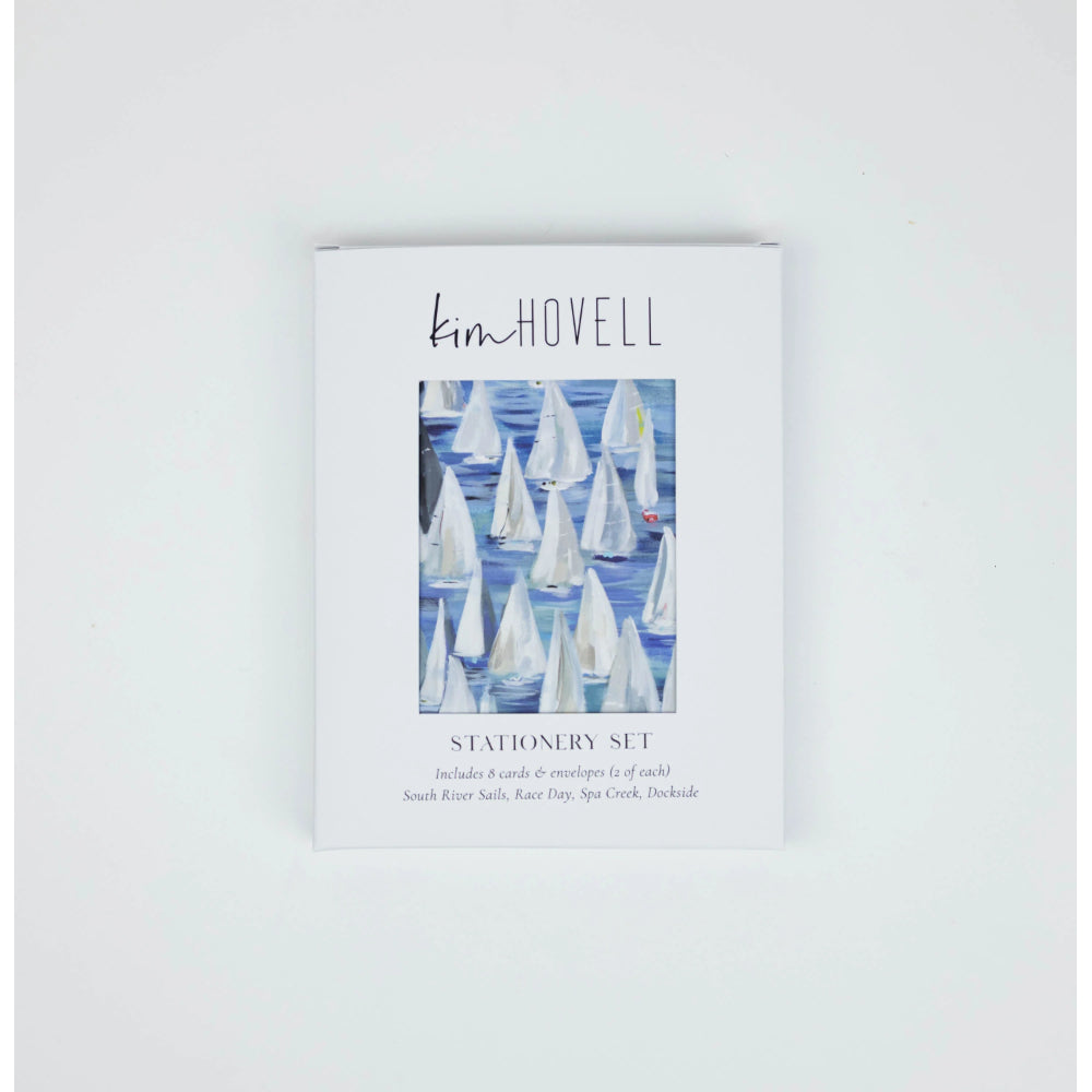 Stationery set packaging with sailboat design and 'kim Howell' branding on a white background