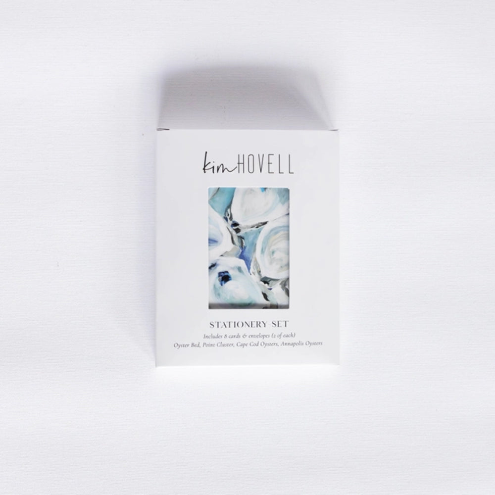 Stationery set packaging with floral design and 'kim Hovell' branding on a white background