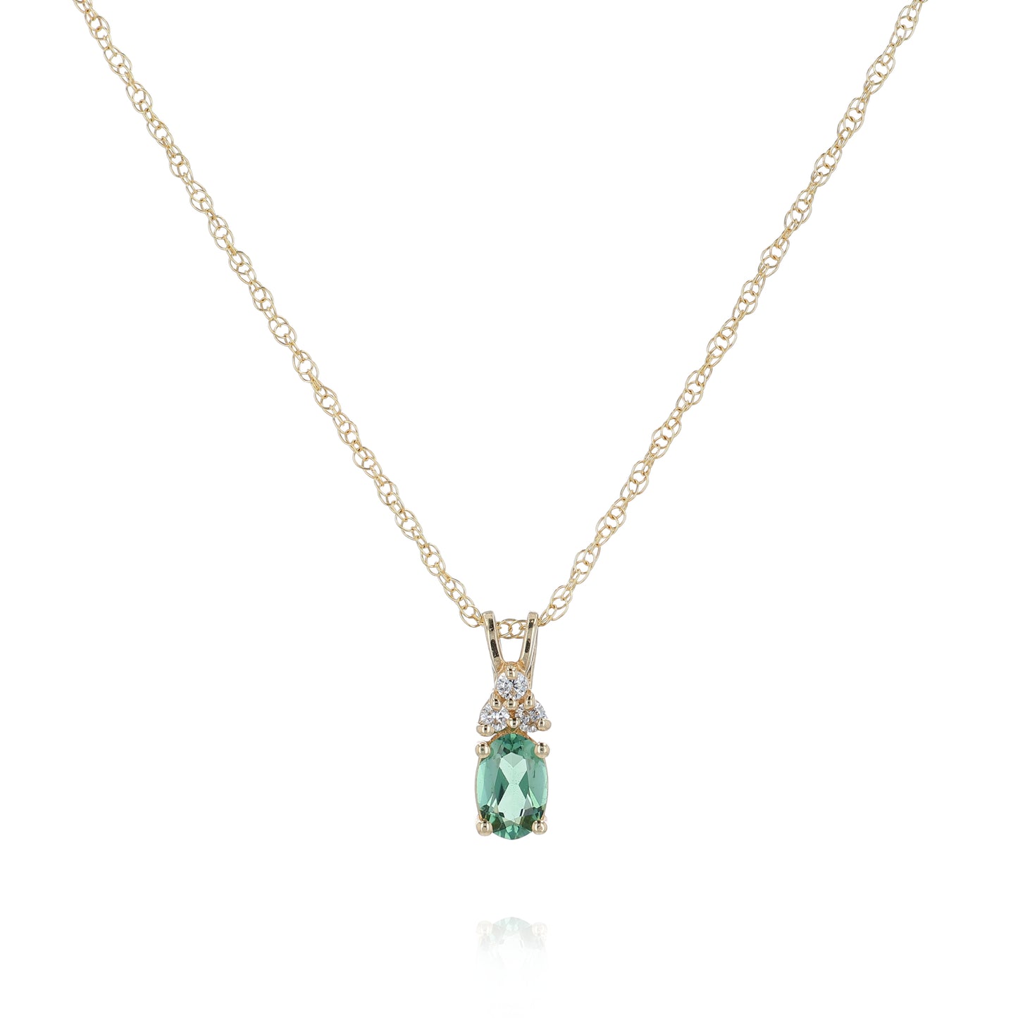 Yellow gold oval natural alexandrite and diamond pendant necklace on a white background