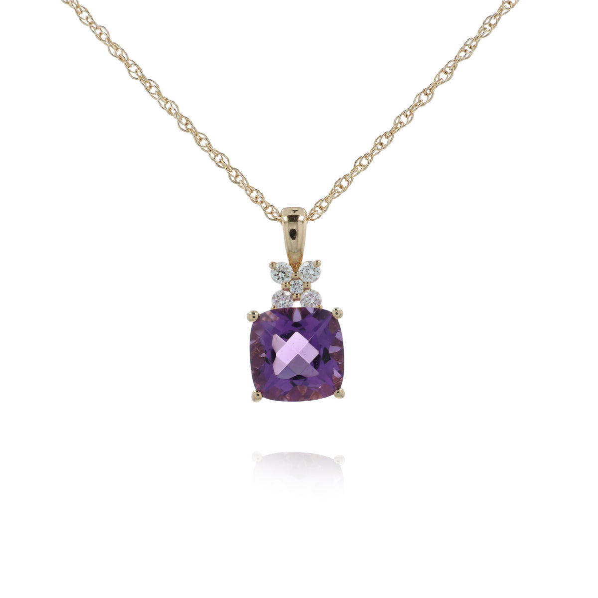 A gold necklace with a cushion-cut purple amethyst pendant and small clear accent stones, shown on a clean white background with a soft reflection.