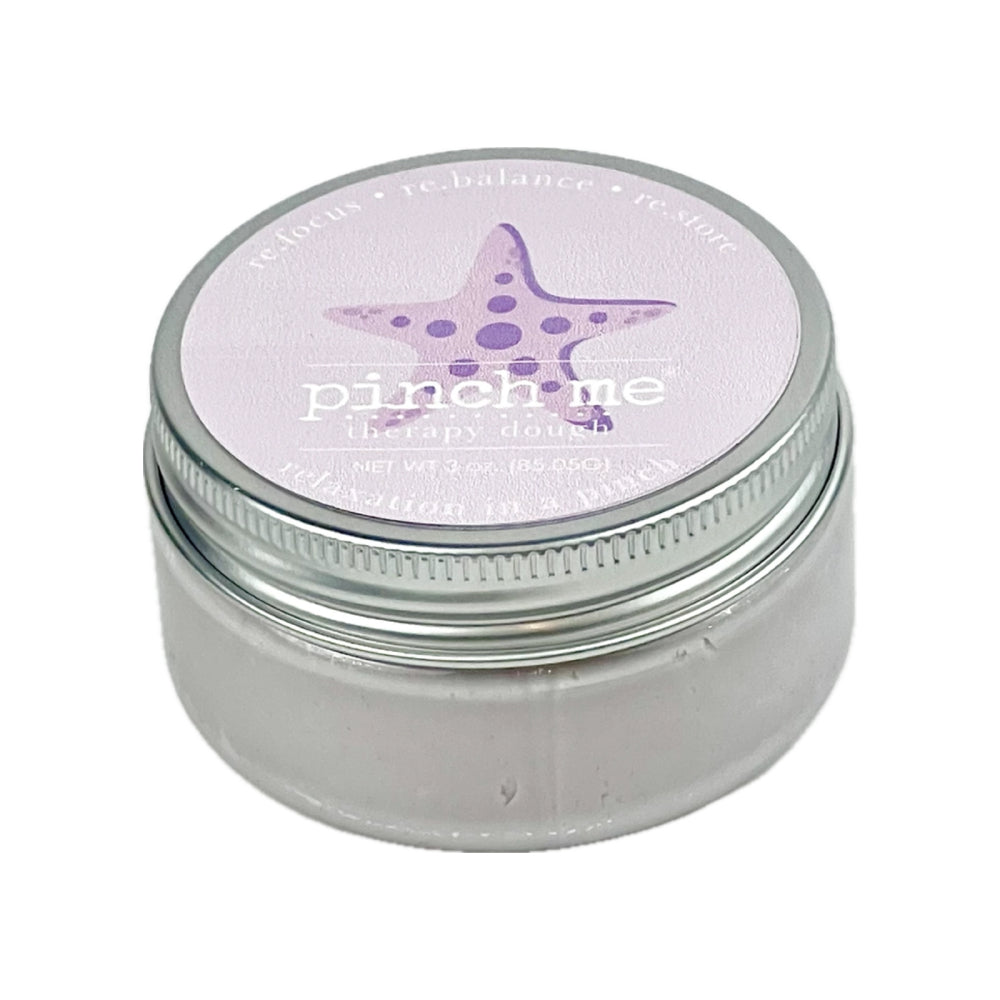A purple jar of Starfish therapy dough with a starfish design on the lid, labeled 'pinch me' on a white backround. 