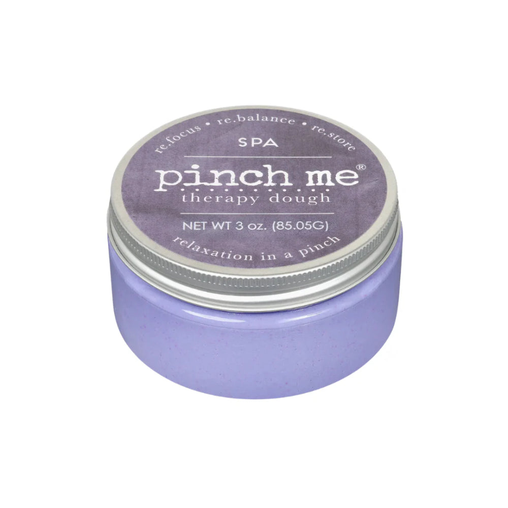 Jar of purple Spa 'pinch me' therapy dough with and silver lid and a purple label on a white background.