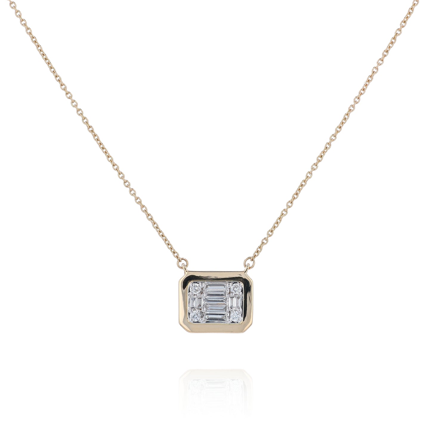 Yellow gold mixed cut diamond cushion pendant necklace on a white background