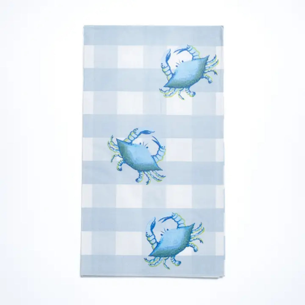 A rectangular kitchen towel with a light blue and white gingham check pattern, decorated with three blue crabs with yellow accents, shown flat against a white background.