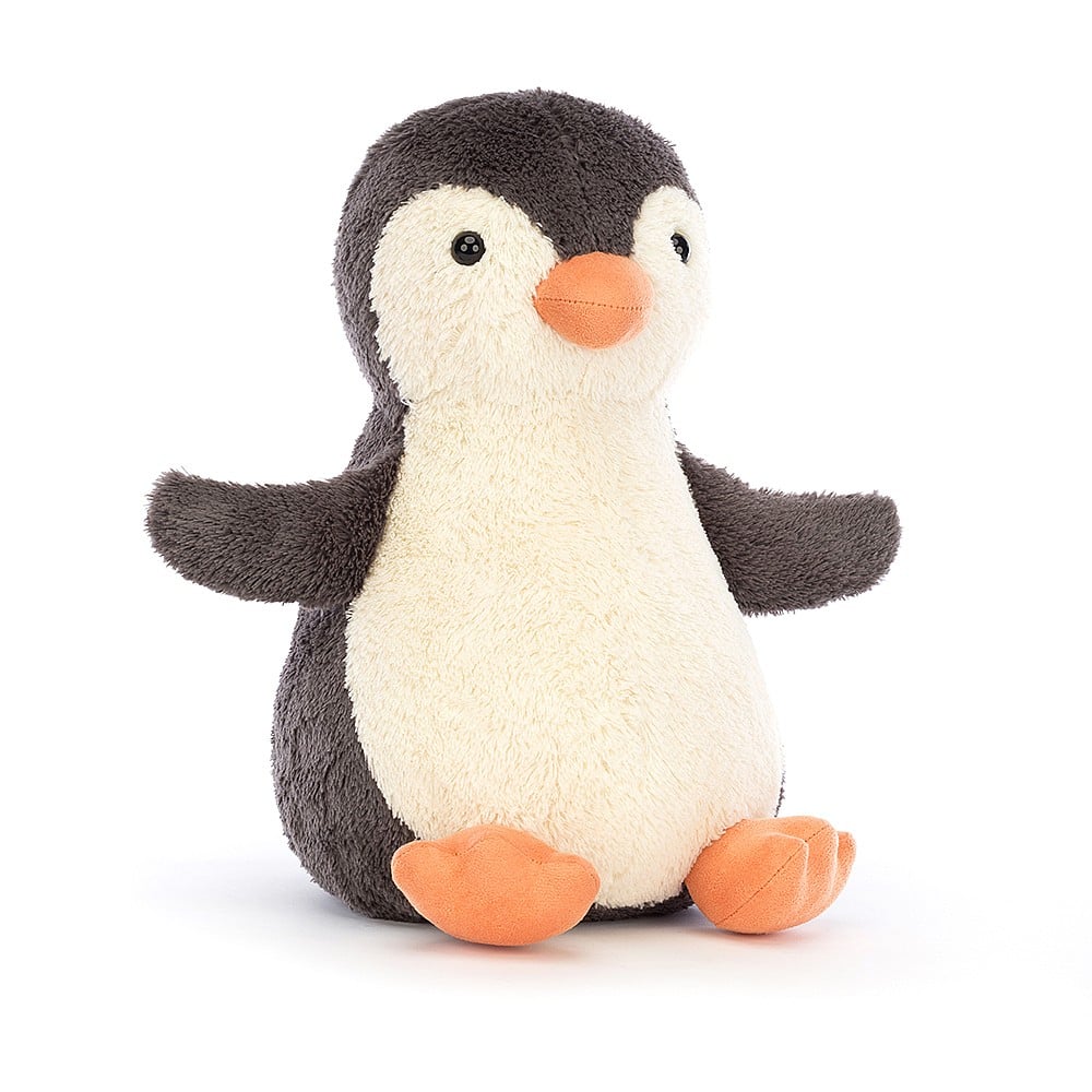 Large stuffed penguin toy on a white background