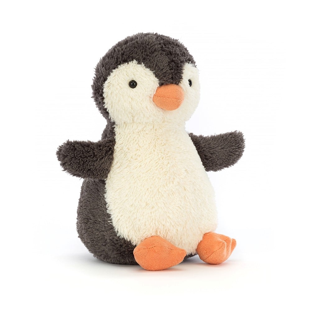 Medium stuffed penguin toy on a white background