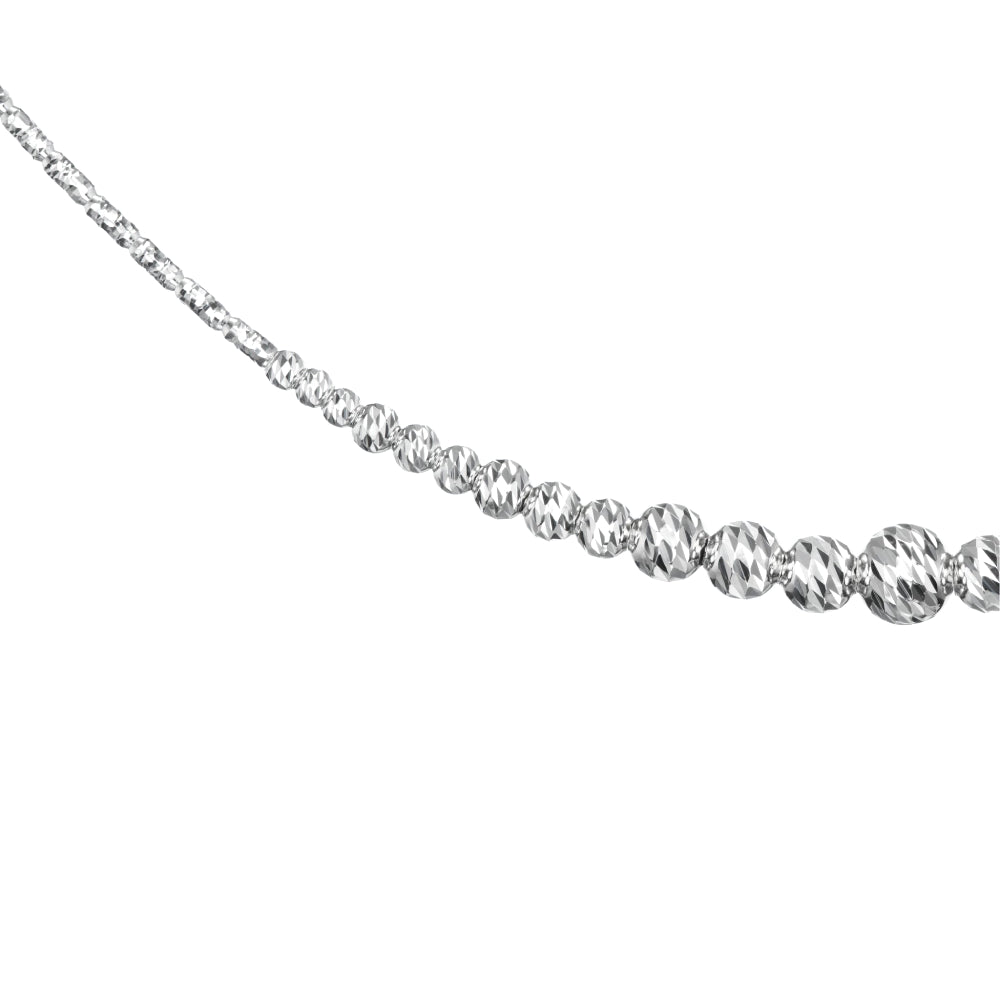 Graduated platinum bead necklace on a white background