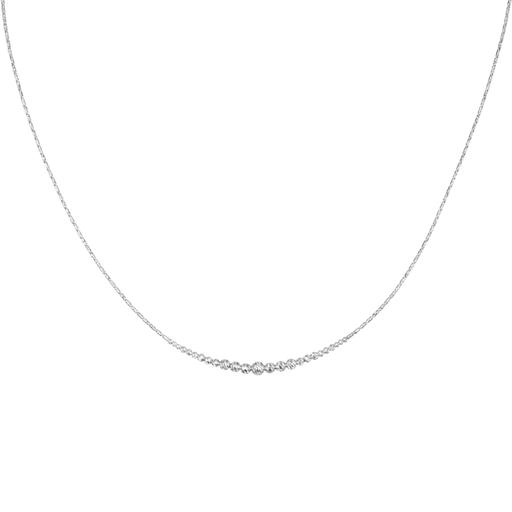 Graduated platinum bead necklace on a white background