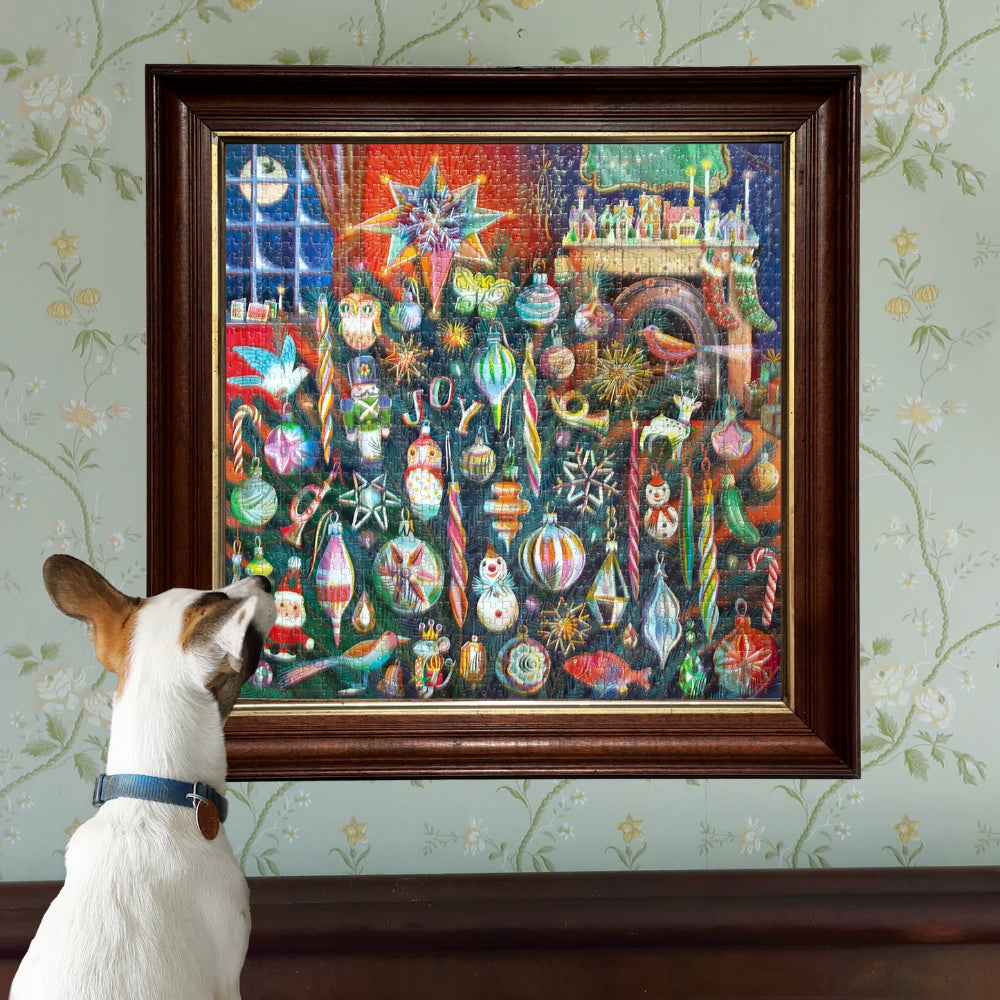 Dog looking at a colorful framed artwork on a wall with floral patterns.