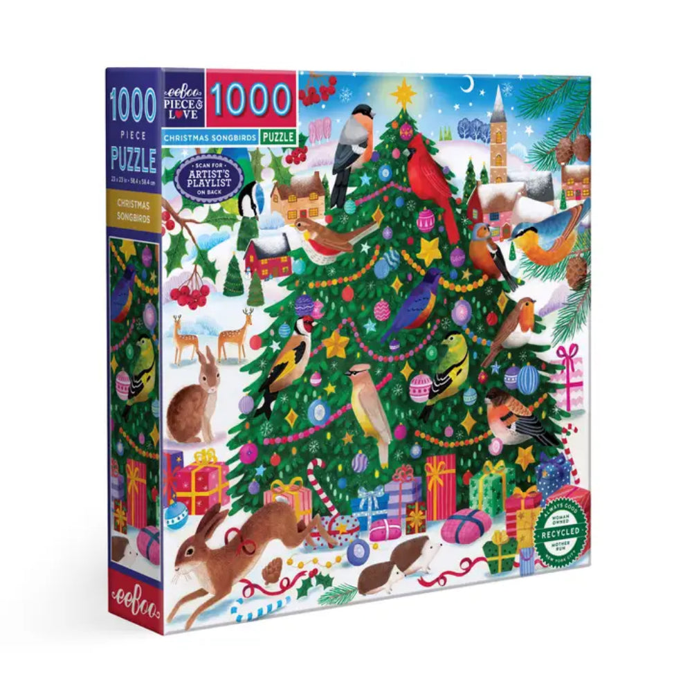 A 1000-piece jigsaw puzzle box titled 'Christmas Gardens' by Soho Puzzles, featuring a colorful winter illustration of a decorated Christmas tree with birds, rabbits, gifts, and festive scenes.