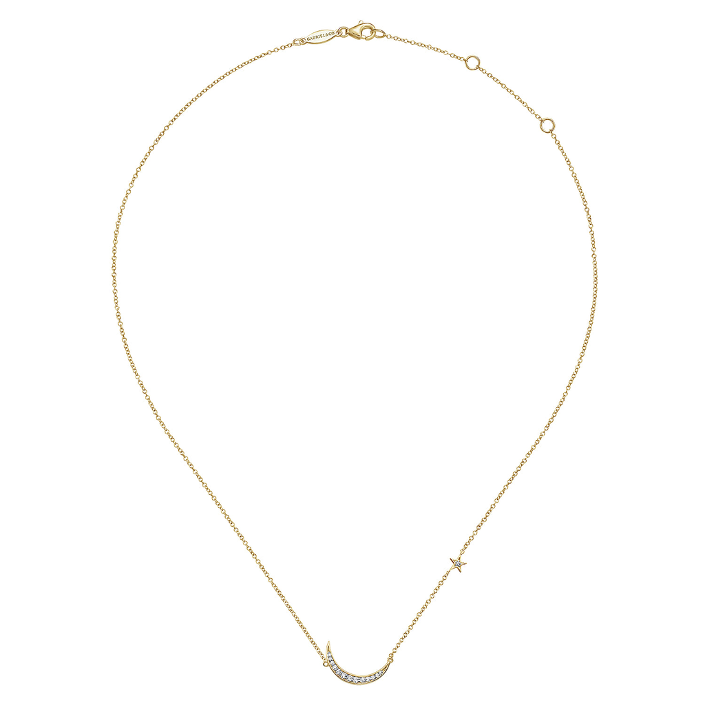 Gold necklace with small diamond-like stones on a white background