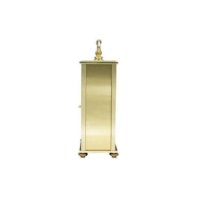 A tall, narrow brass cabinet or lantern with a single door, decorative top finial, and small feet, shown against a plain white background.