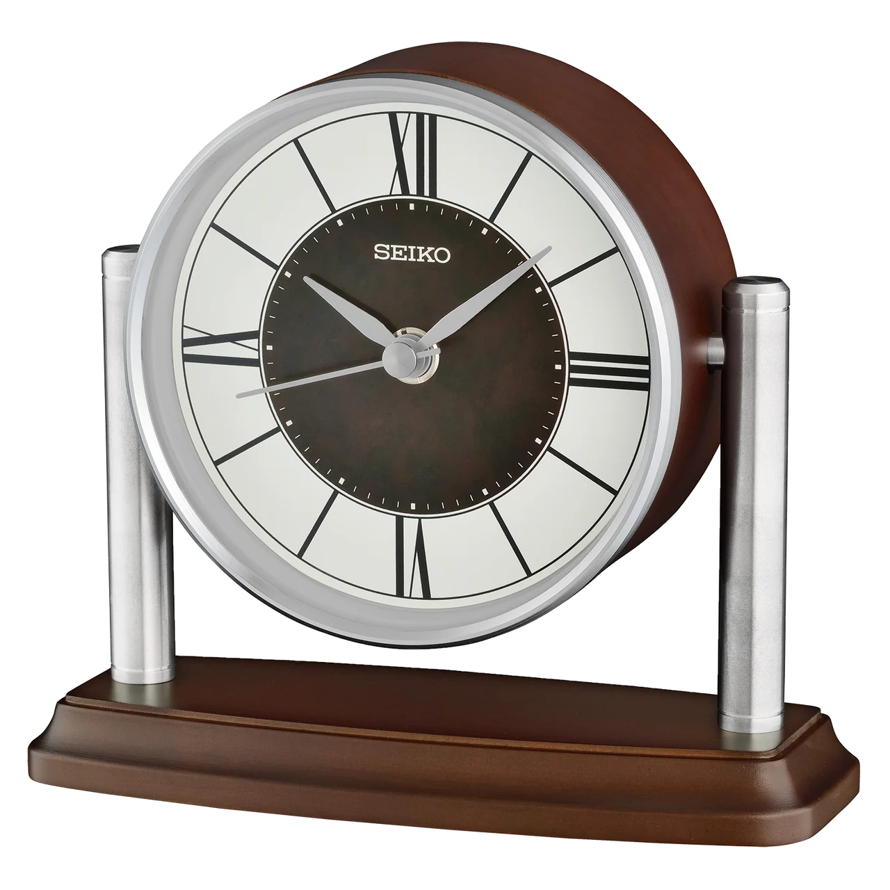 A Seiko tabletop clock with a brown wood-grain finish, silver metal frame and pillars, and a white dial with black Roman numerals.