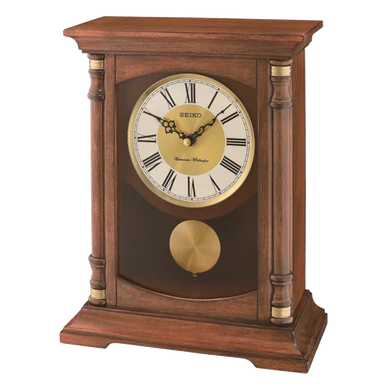 A Seiko wooden mantel clock with a warm brown wood body, a cream-colored clock face with black Roman numerals, and gold-tone accents, isolated on a white background.