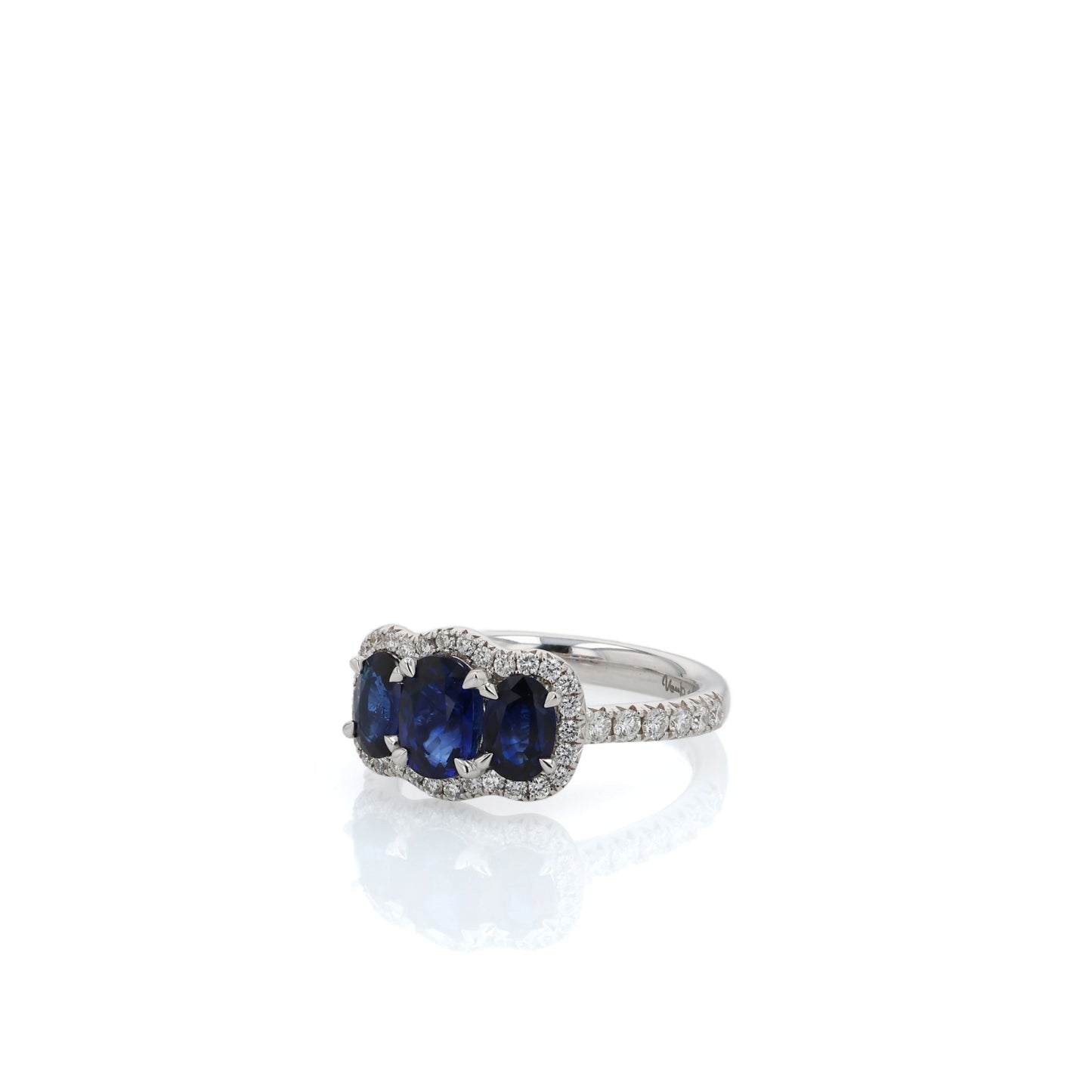 18k White Gold Sapphire and Diamond Three Across Halo Ring