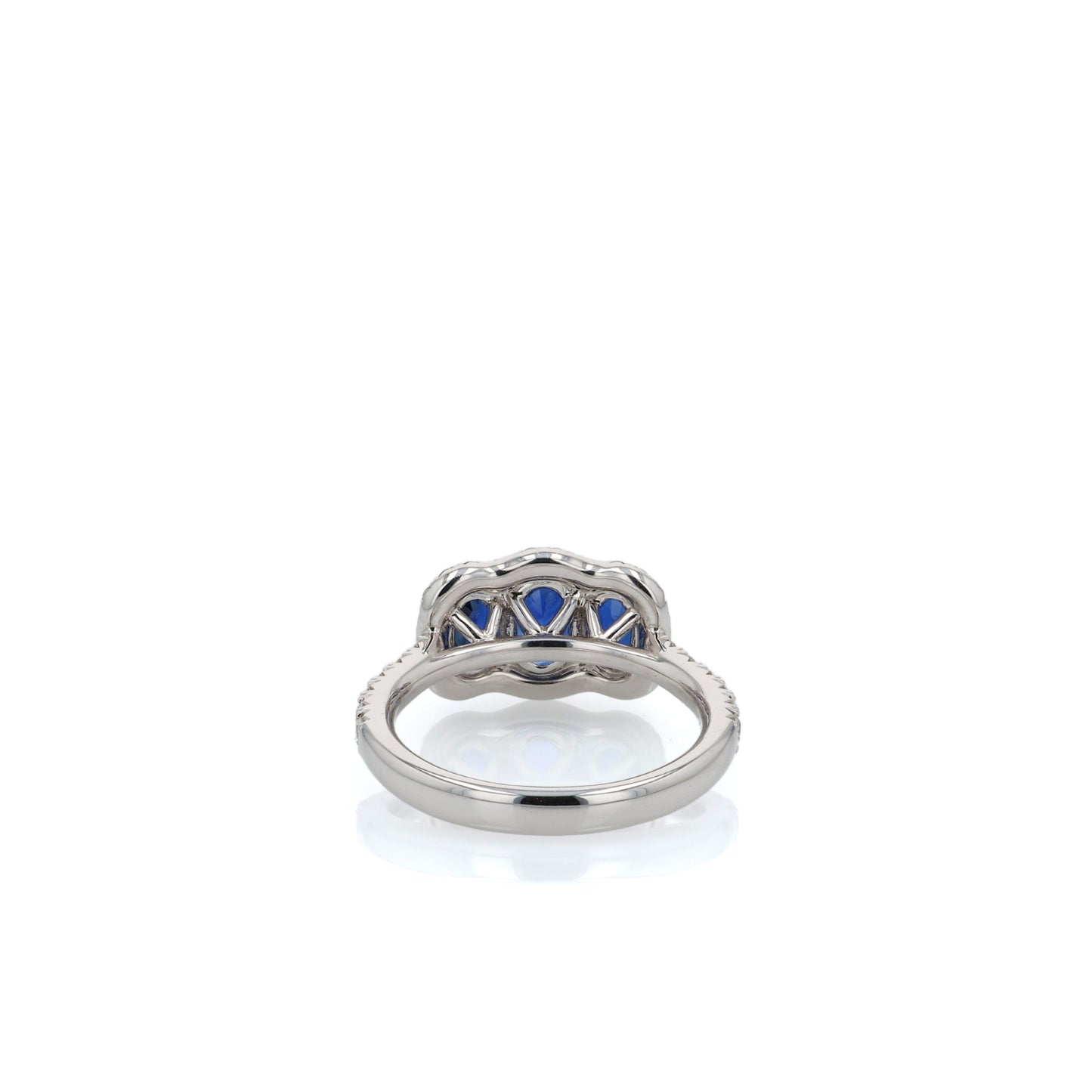 18k White Gold Sapphire and Diamond Three Across Halo Ring