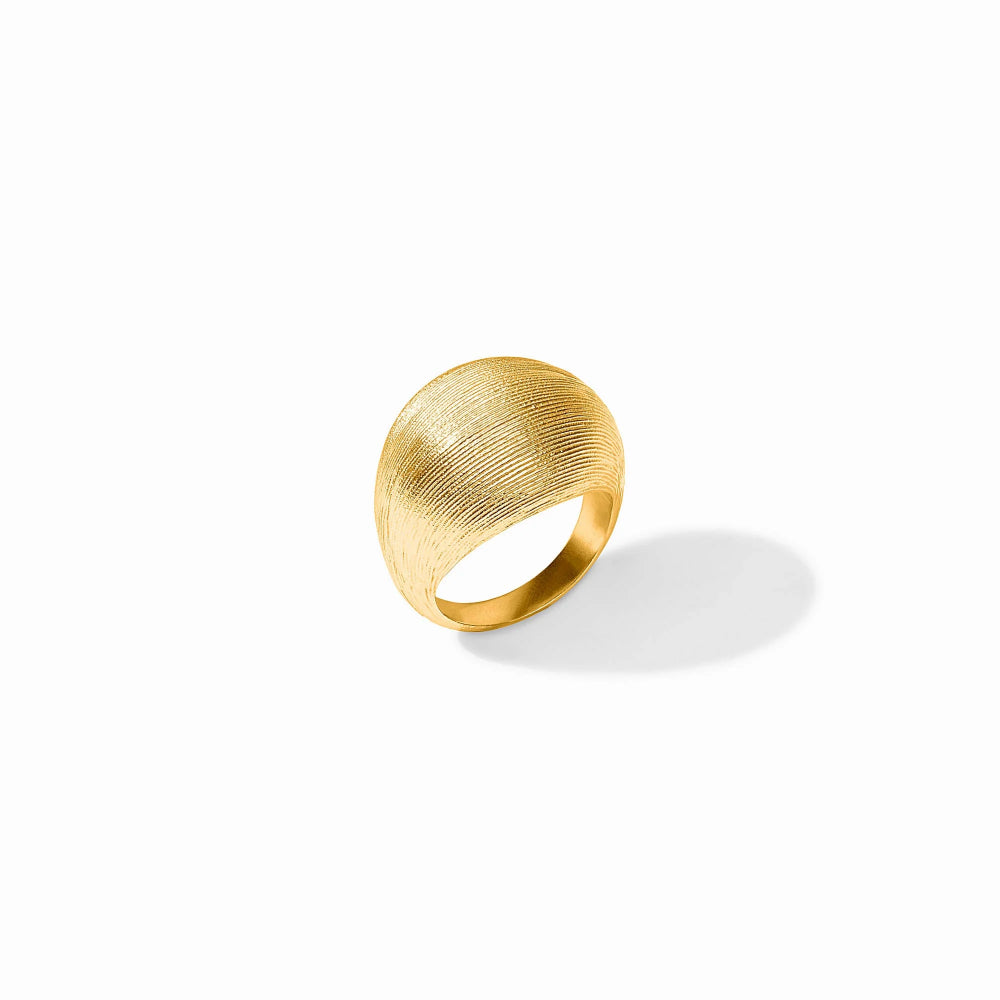 A textured gold ring with a rounded, dome-like top and a smooth band, shown on a clean white background with a soft shadow.