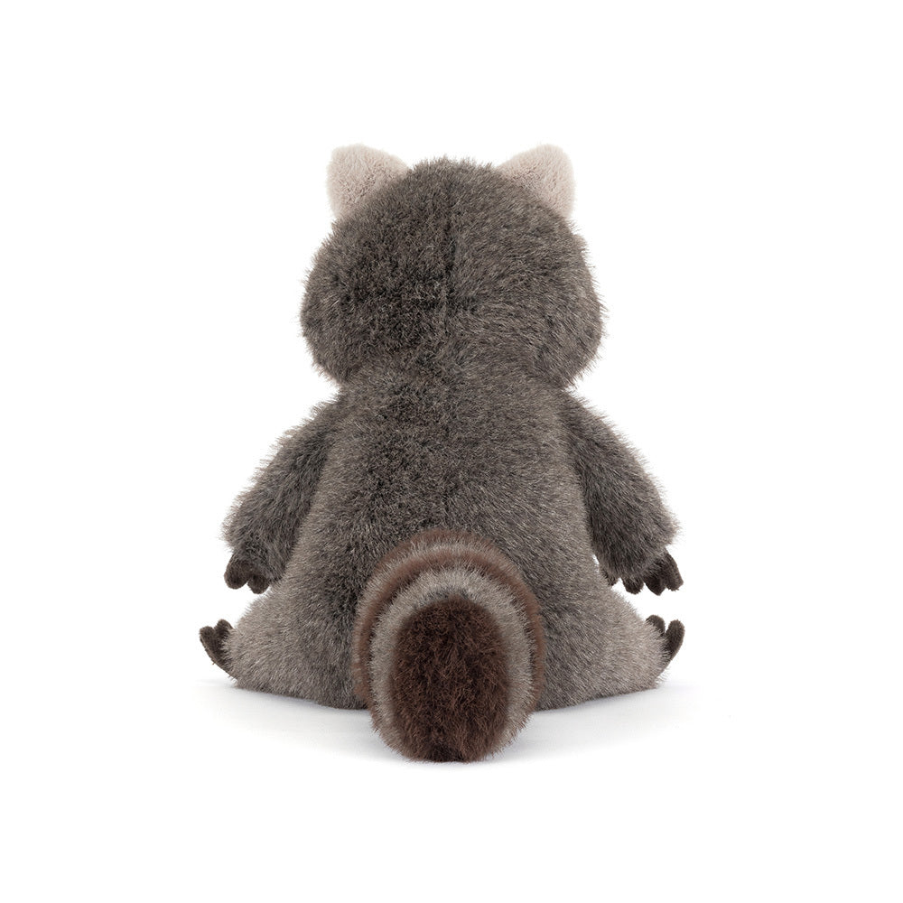A  photo of the back of a grey stuffed raccoon on a white background.
