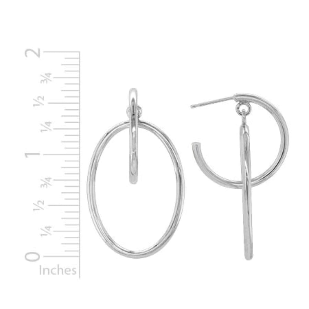 A pair of sterling silver round and oval hoop drop earrings next to scale