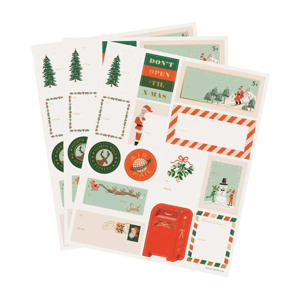 A set of vintage Christmas-themed postcard sheets with illustrations of Santa Claus, snowmen, Christmas trees, holly, a red mailbox, and festive borders on a white background.