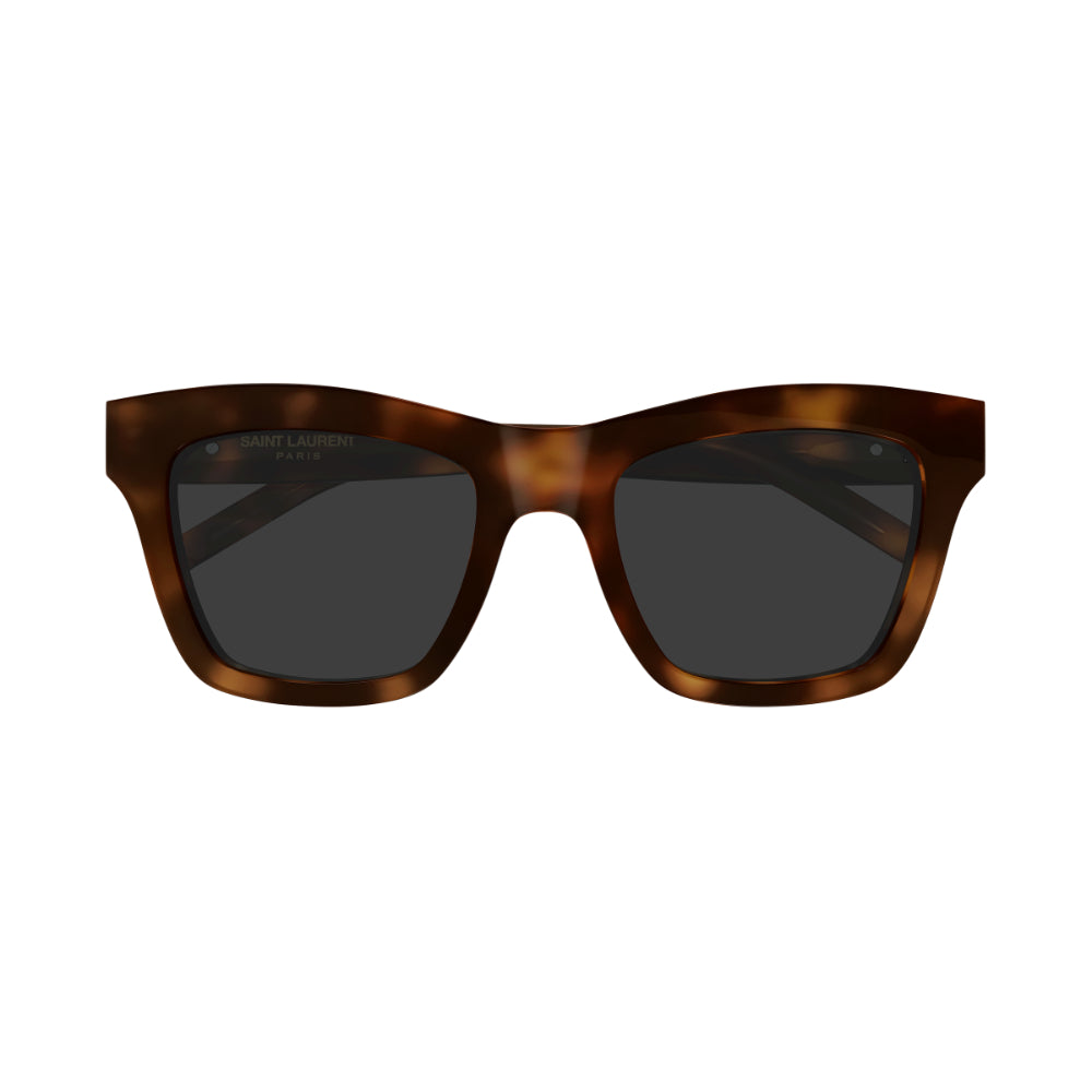 Sunglasses with tortoiseshell frame and dark lenses on a white background