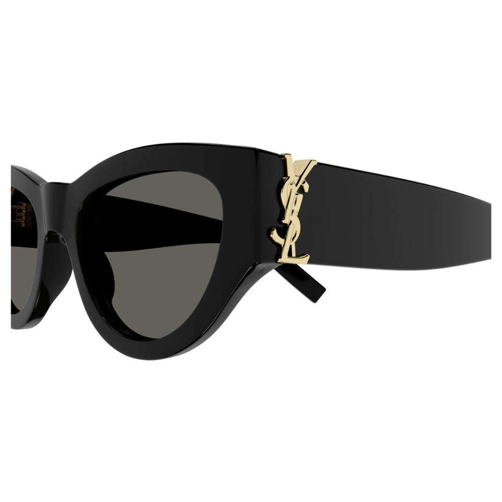 Black cat-eye sunglasses with dark lenses and a gold-tone YSL logo on the temple, shown against a plain white background.