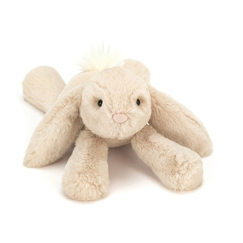 Medium size beige plush bunny toy on a white background.