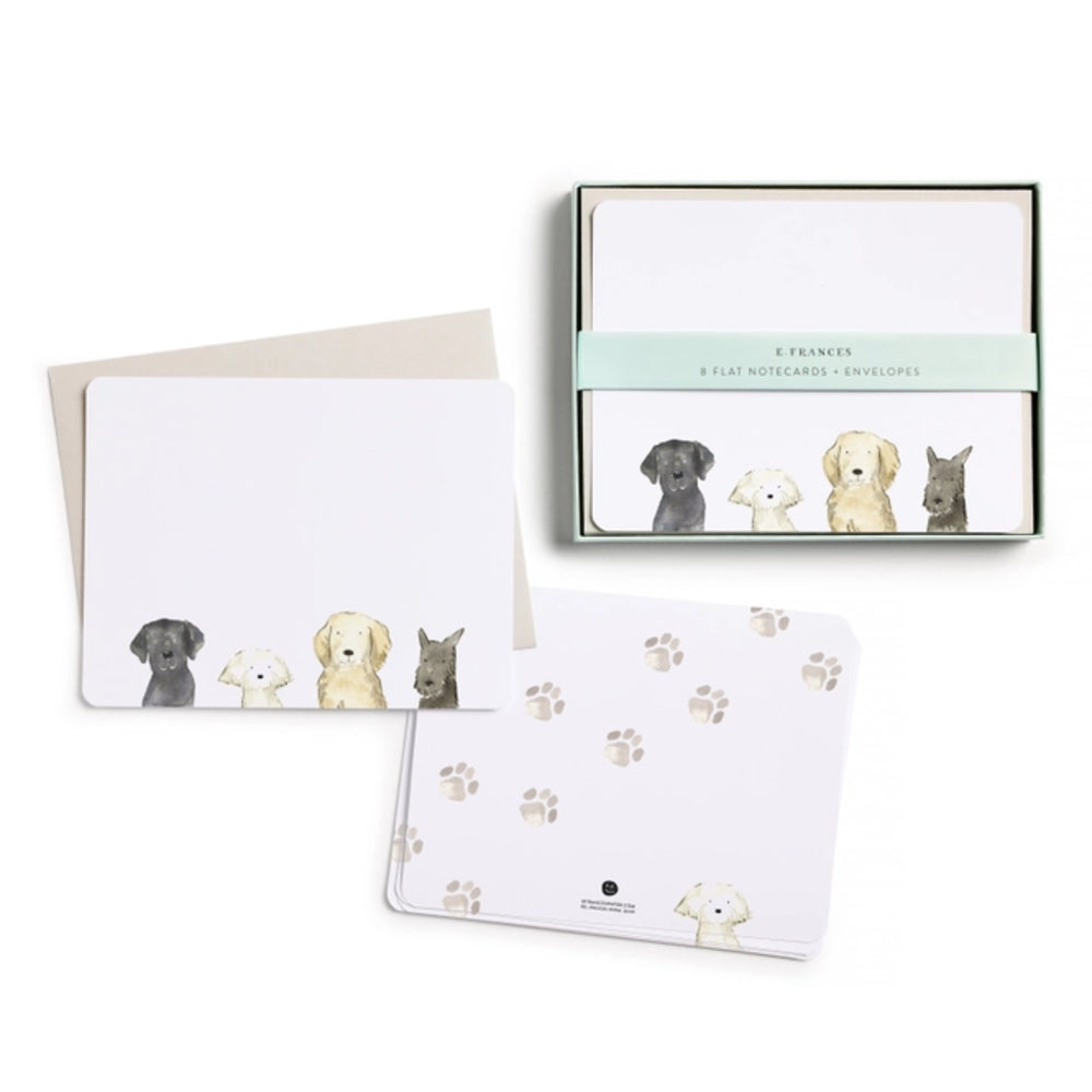 Set of stationery items with dog illustrations on a white background