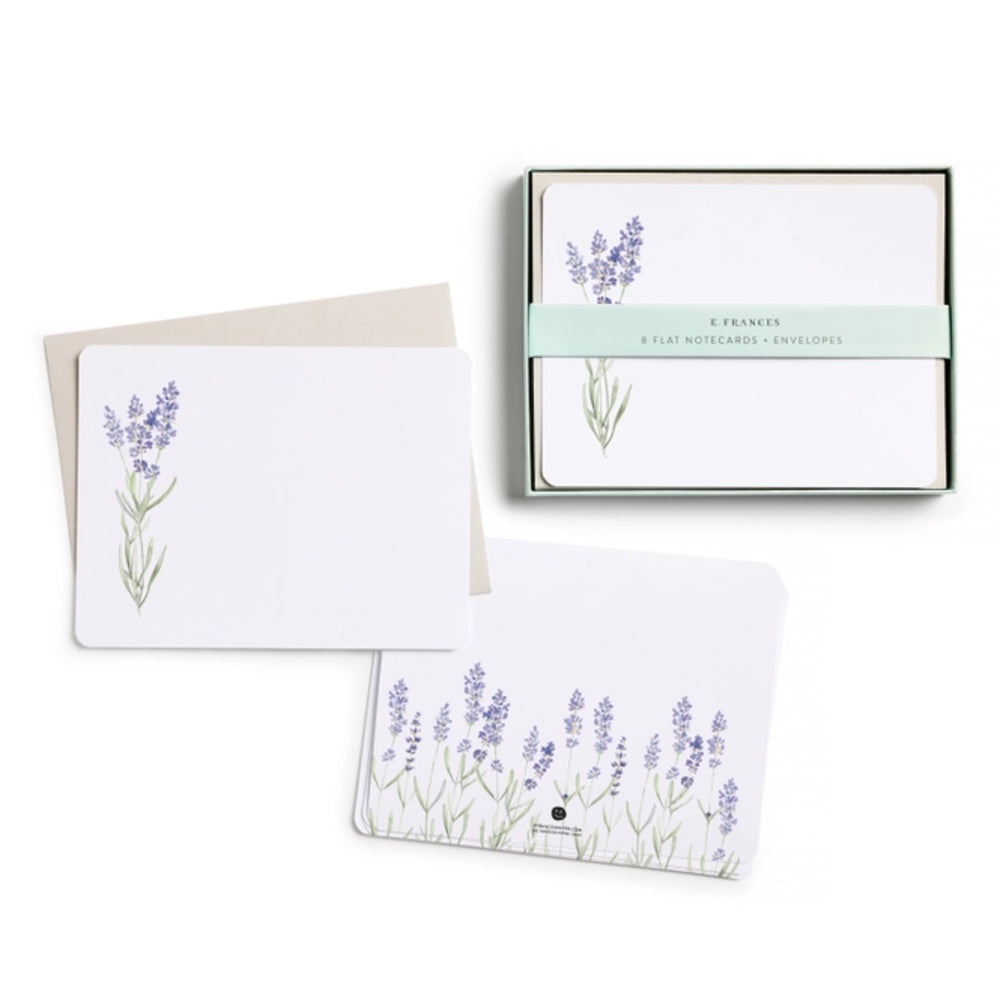 Set of stationery items with lavender designs on a white background.