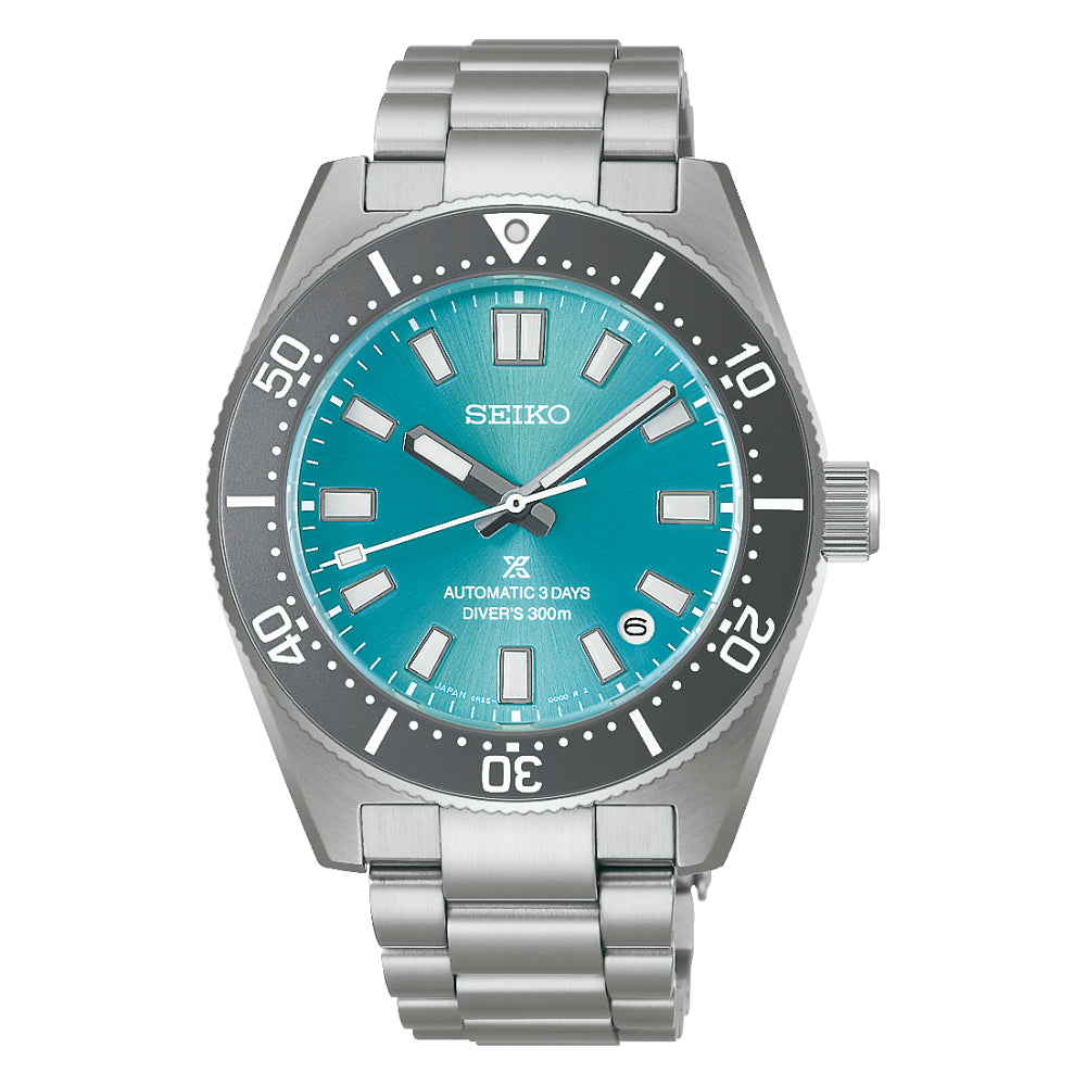Seiko watch with a blue face and silver metal strap on a white background