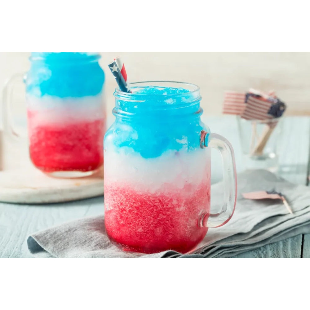 Two mason jars with layered red, white, and blue drink on a light surface.