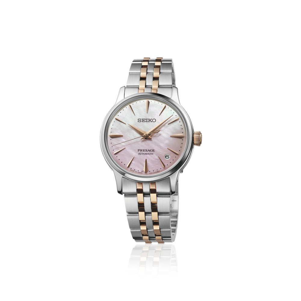 Two-Tone Watch with Pink Dial on a White Background