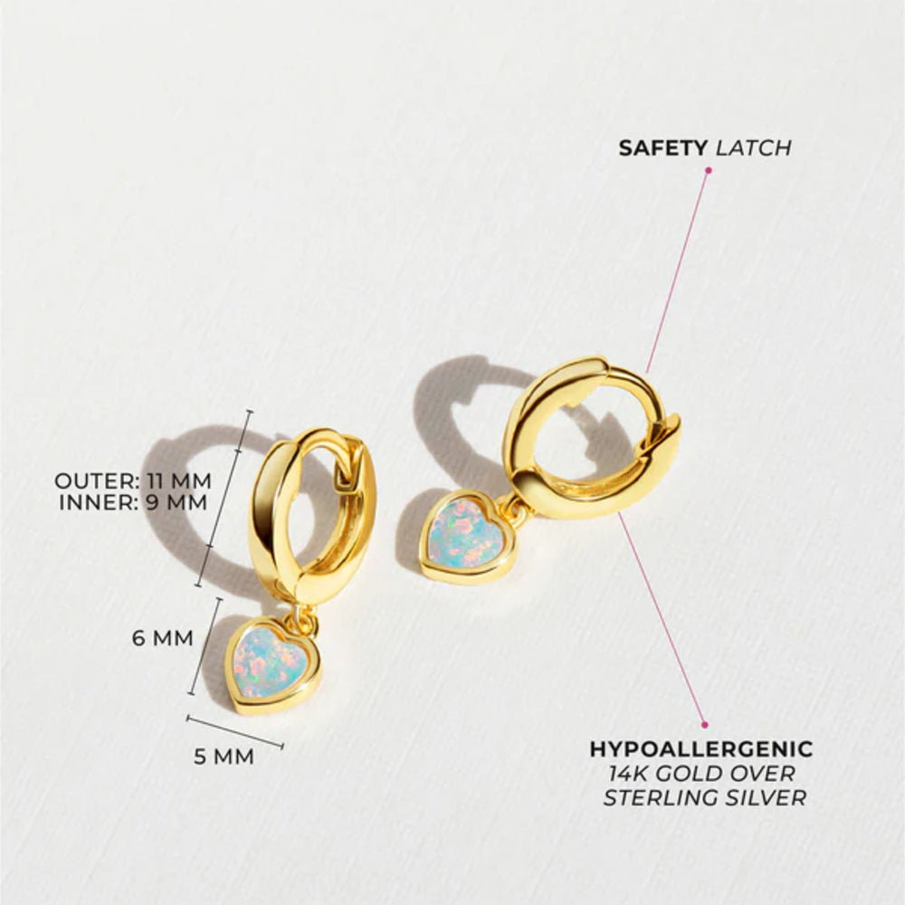Gold hoop earrings with heart-shaped charms on a white background, showing measurements and material details.