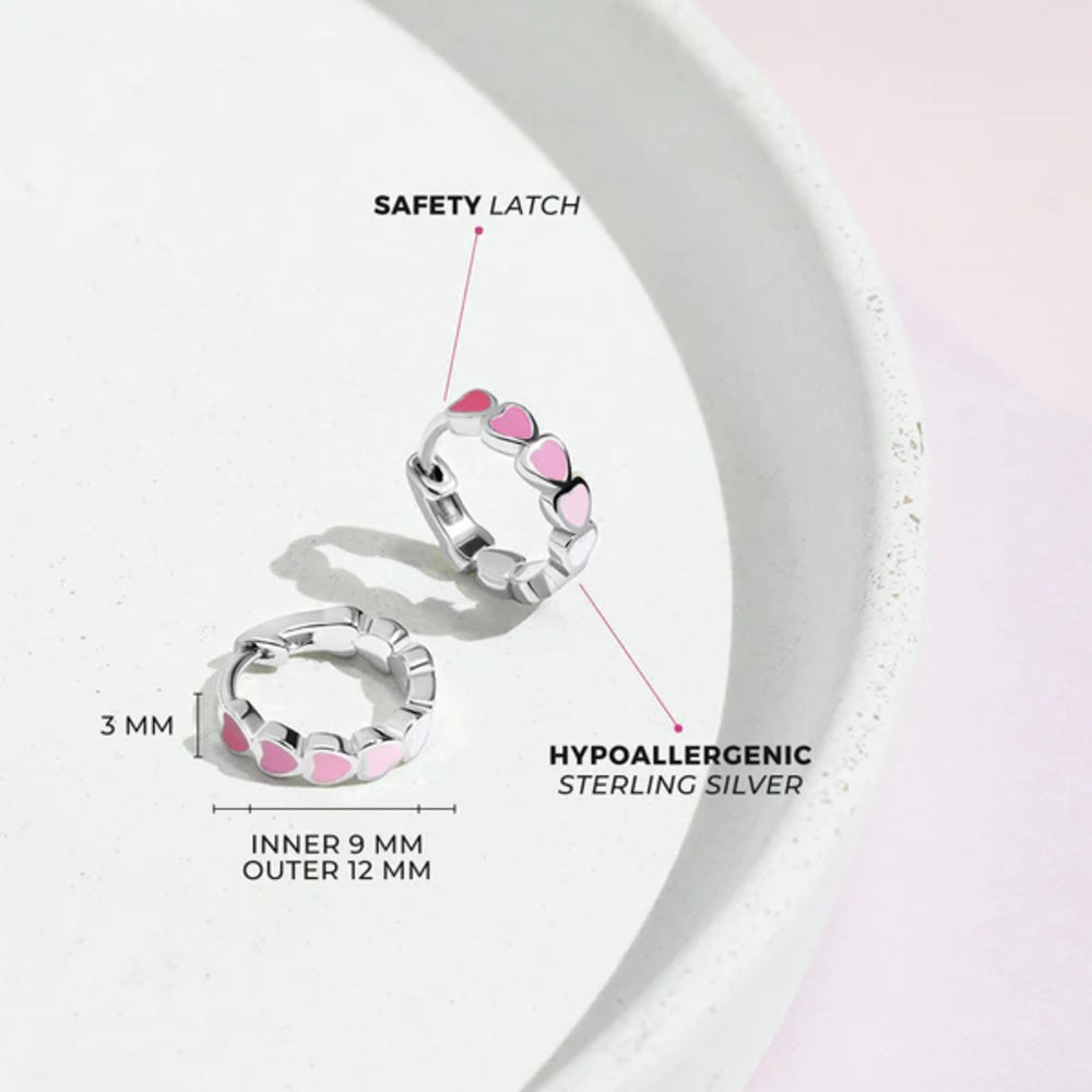 Hoop earrings with safety latch and hypoallergenic sterling silver details on a white background