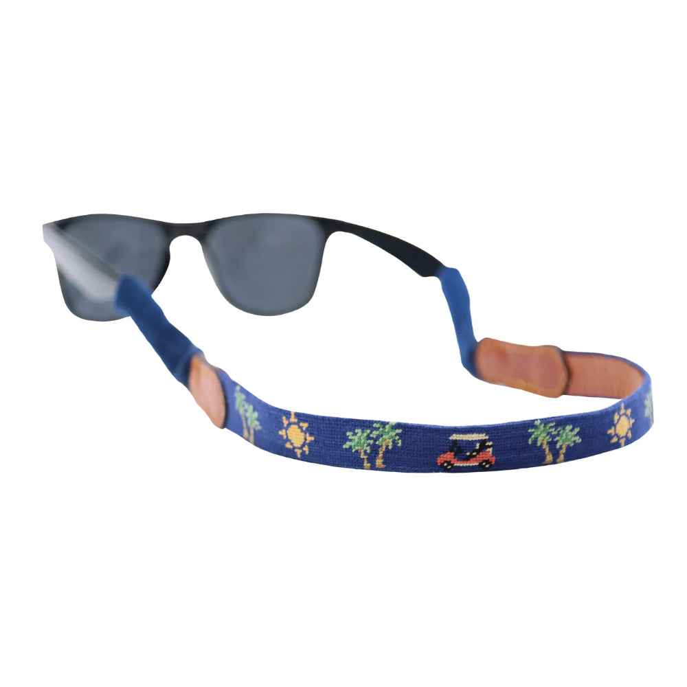 Smathers & Branson beachy golf sunglass strap (classic navy) on a pair of sunglasses on a white background