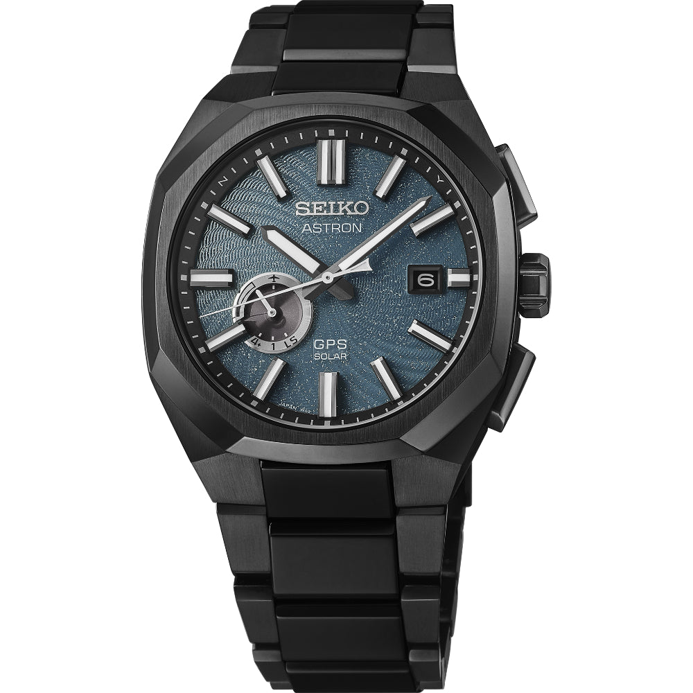 A Seiko Astron GPS Solar watch with a black octagonal case, black link bracelet, and a textured blue dial with silver-tone indices.