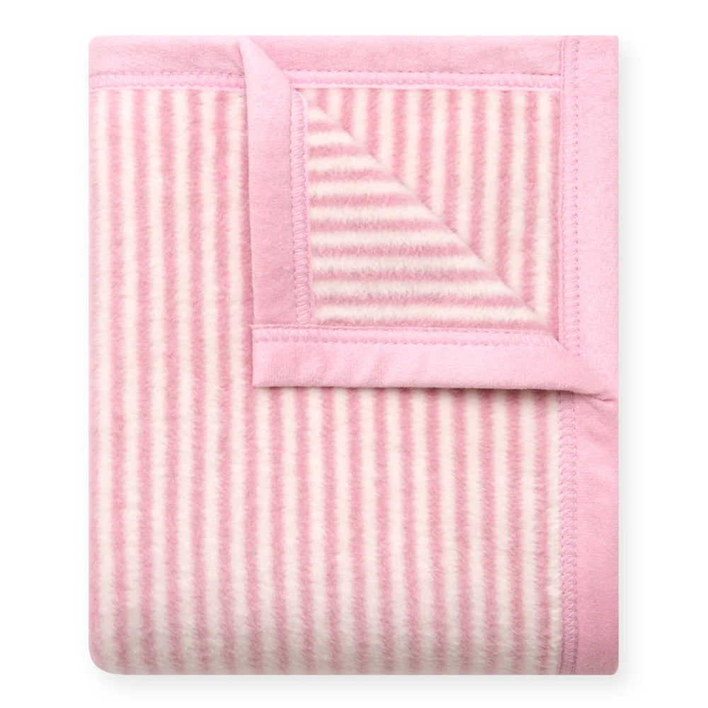 Pink and white striped mini blanket on a white background