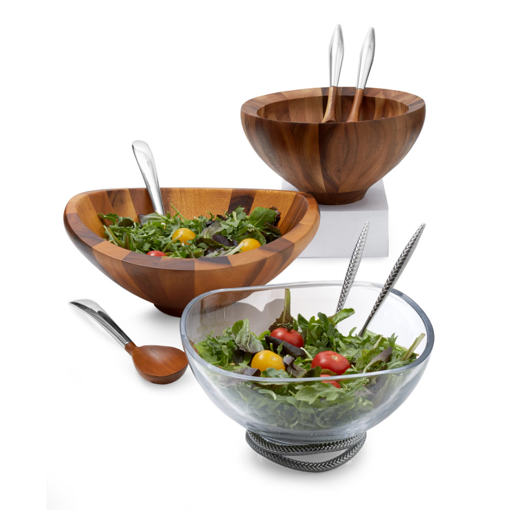 Salad bowl servers with salad on white background