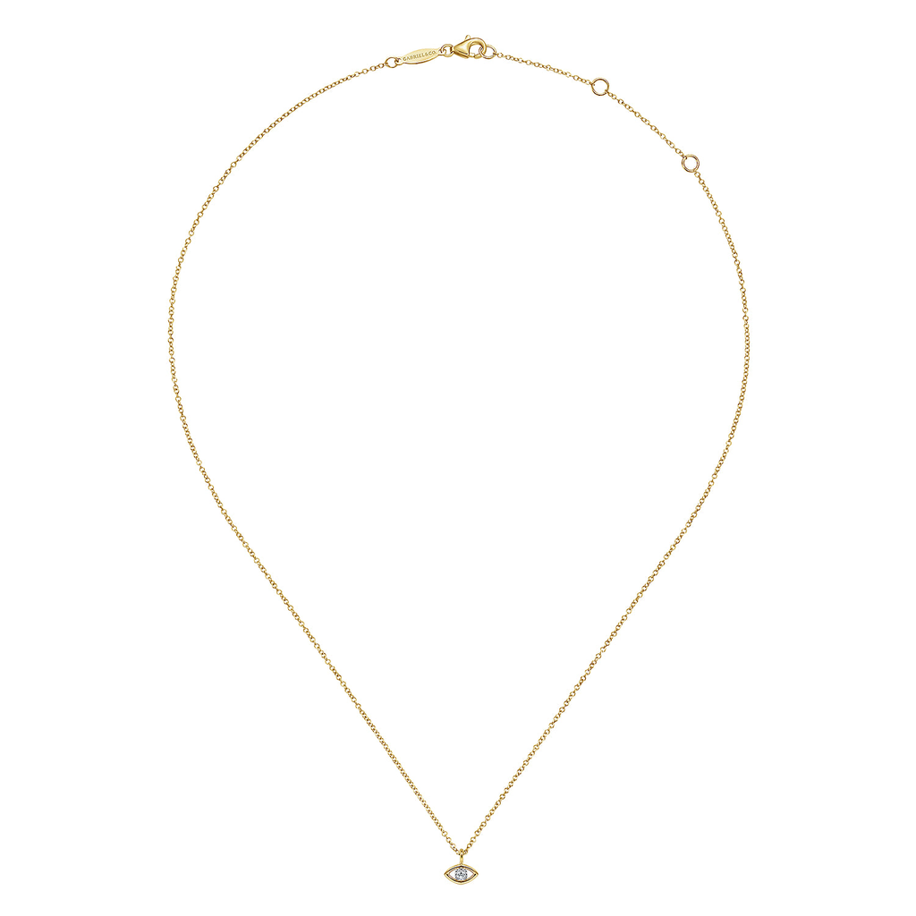 Gold necklace with a small pendant on a white background
