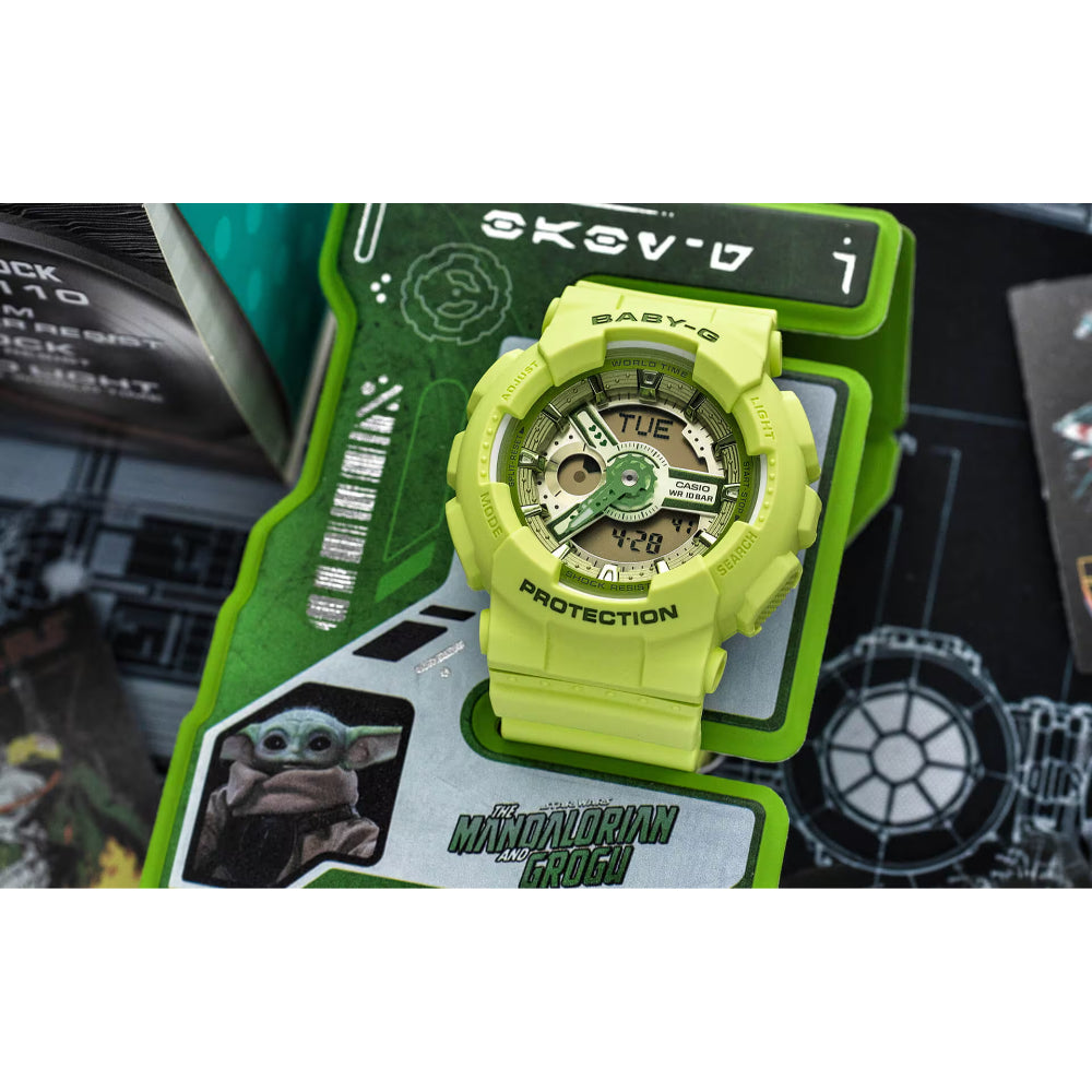 Green and yellow watch with 'Baby-G' branding on a display card featuring 'The Mandalorian' design.