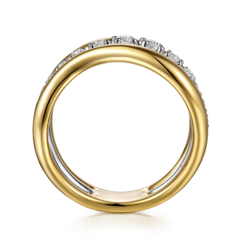 gold ring on a white background from the side