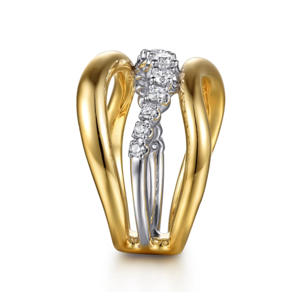 gold and silver 3 row ring with clear stones from the side on a white background