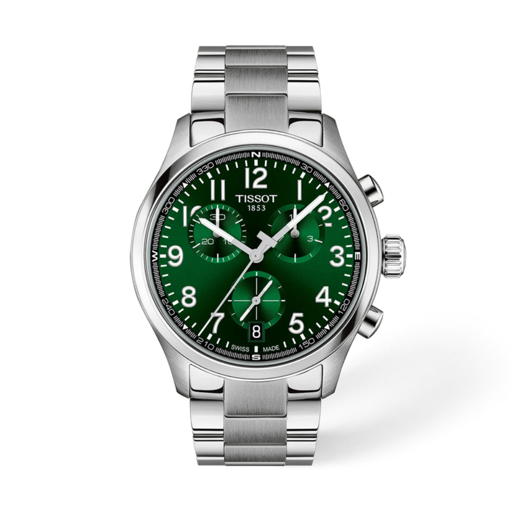 Tissot watch with green face and silver band on a white background