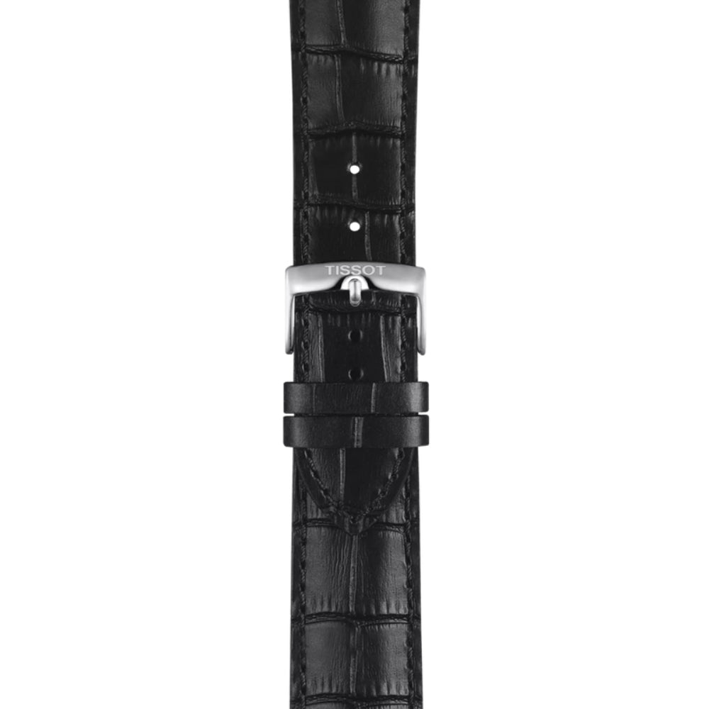 Black alligator-patterned watch strap with Tissot logo on a white background